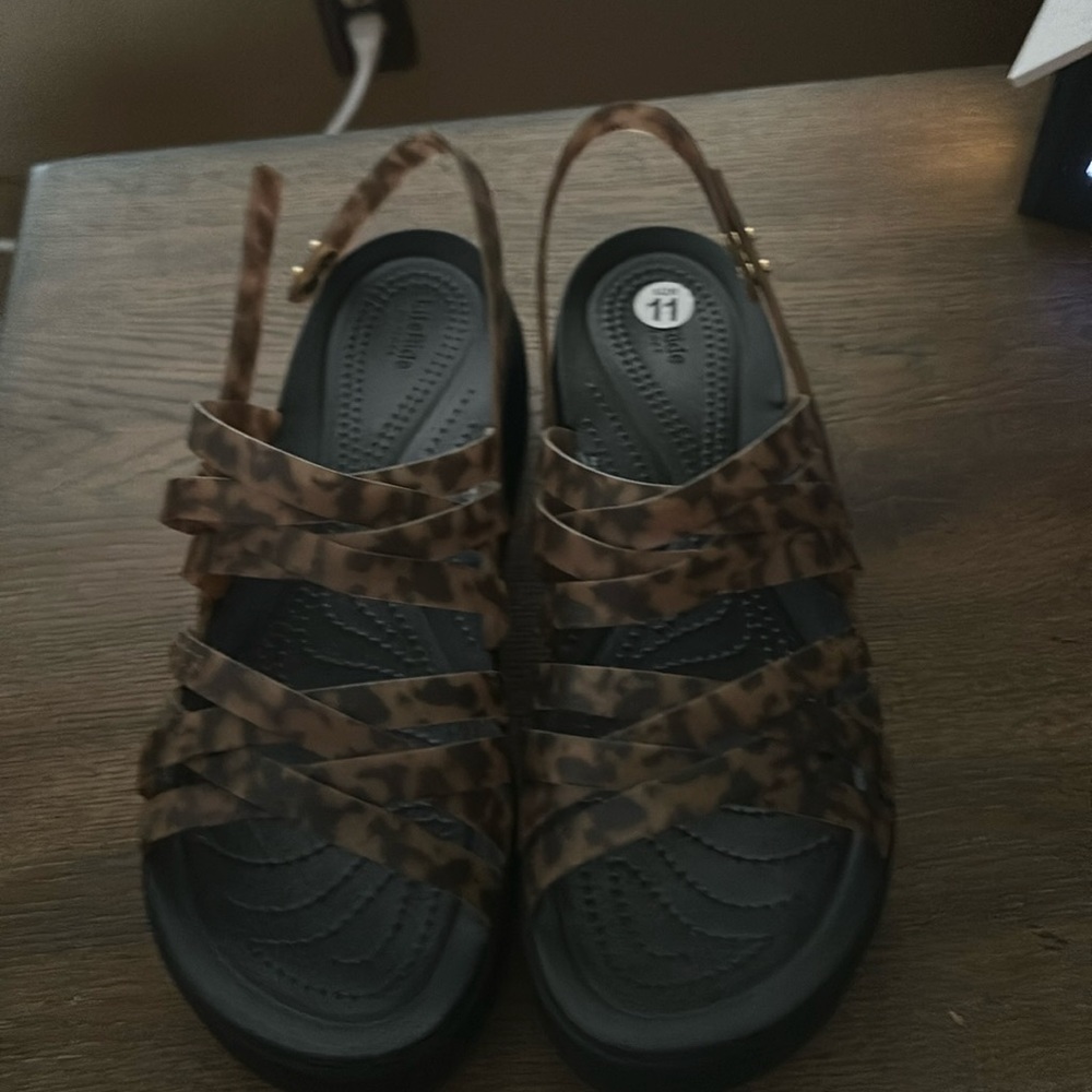 Crocs size 11. New without tags. Leopard print